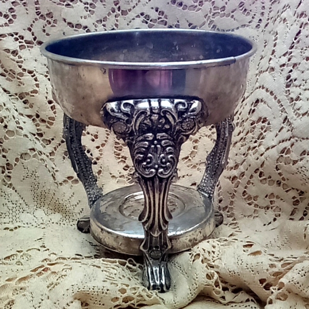 Silver plated coffee carafe bottom holder